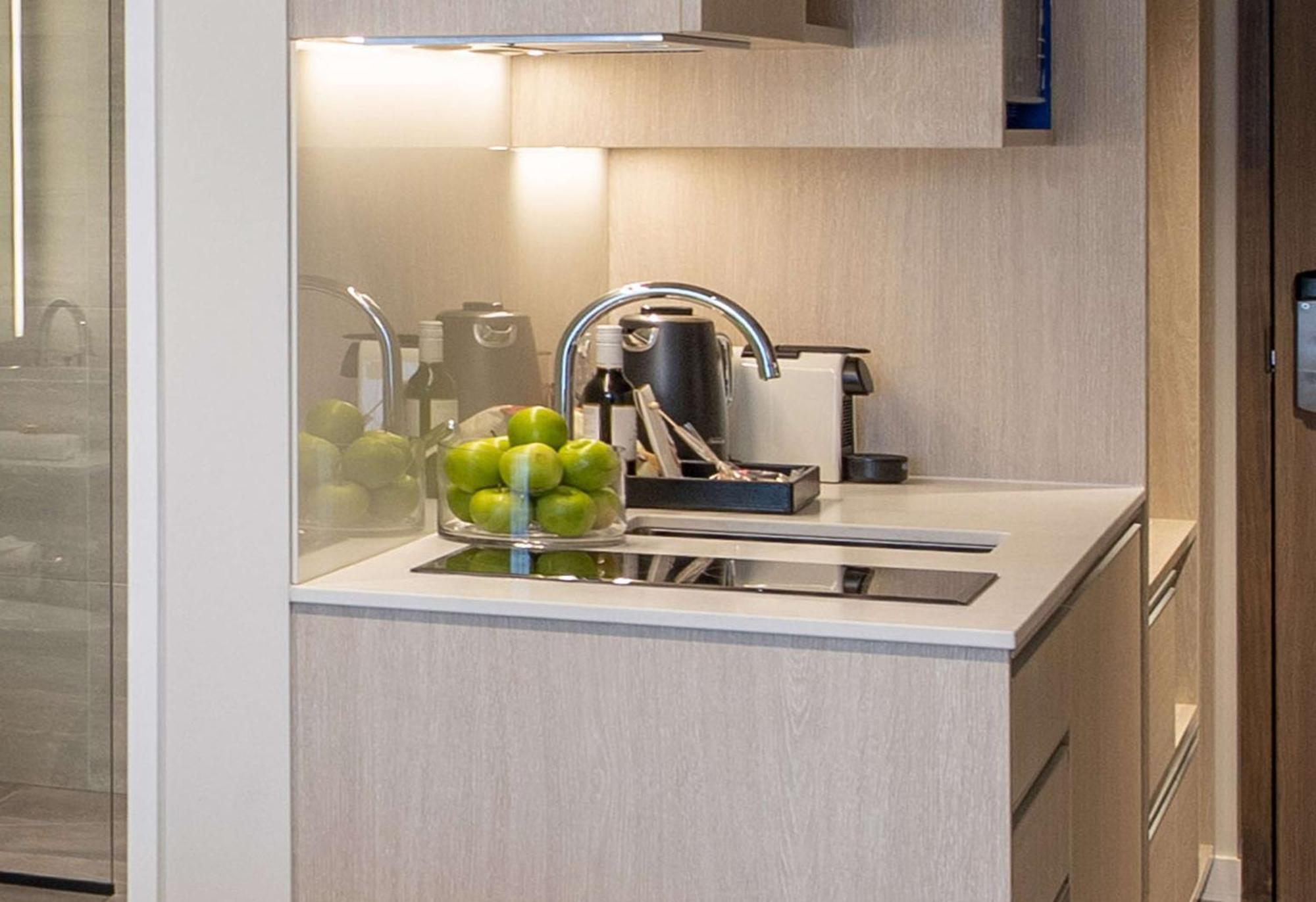 Sudima Christchurch City Exterior photo A kitchen in a serviced apartment